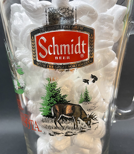Deer on side of pitcher.
