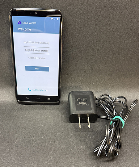 Droid XT1254 with included power adaptor.
