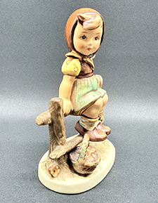 Side view of figurine.