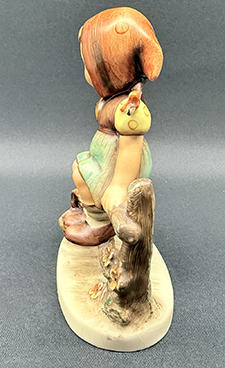 Other side of figurine.