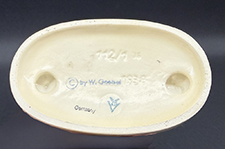 Bottom of figurine.