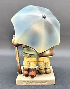 Back view of figurine.